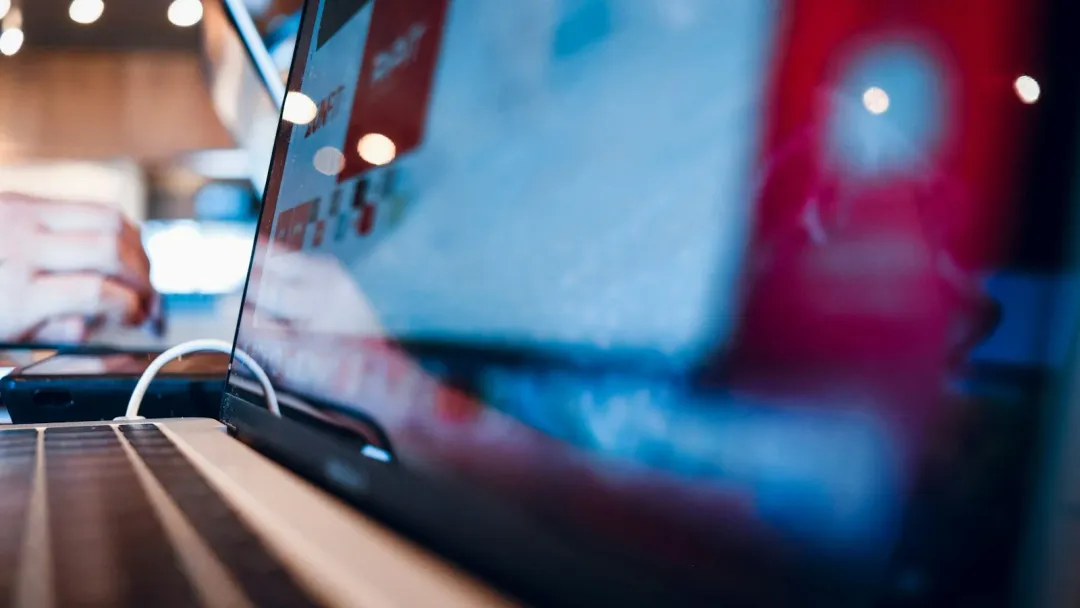 Close-up of an open laptop on a desk