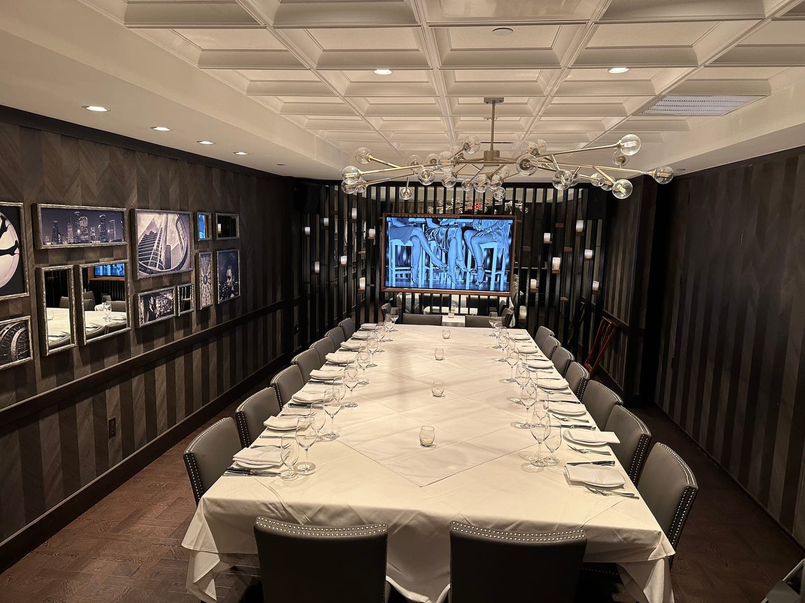 The private dining room at Steak 48 Houston, set with one long table
